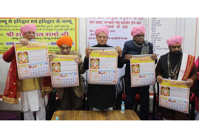 K K Gupta, Pawan Shastri and others releasing Panchang Calendar 2025. K K Gupta, Pawan Shastri and others releasing Panchang Calendar 2025.