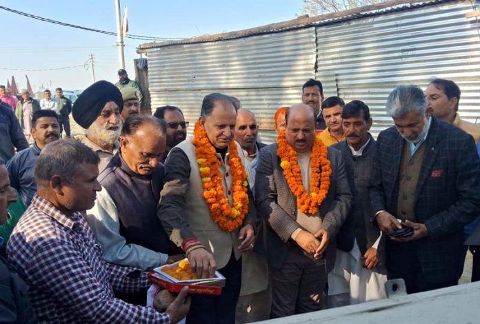 BJP MLA Ramgarh, Dr D K Manyal laying foundation stone of OHT at Channi Fatwal on Tuesday.