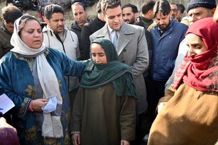 Minister Sakina Itoo meeting affected family members.