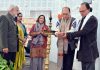 Guests lighting ceremonial lamp to inaugurate Dogri conference by JKAACL.