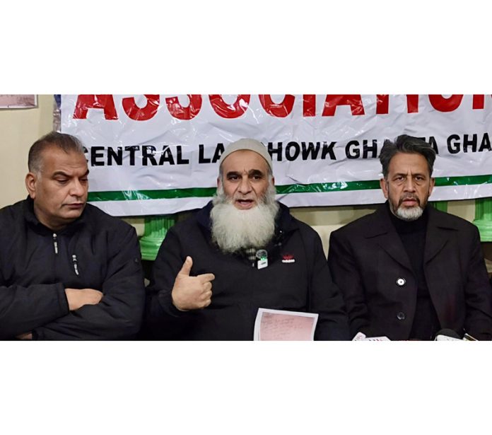 Members of Central Lal Chowk Traders' Association during a press conference in Srinagar on Friday. -Exelsior/Shakeel