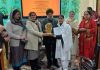 Chief guest, Dr Arvinder Singh Aman felicitating winner of quiz competition in Jammu on Saturday.