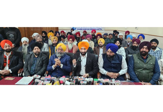 Chairman AJKSCC, Ajit Singh flanked by others addressing press conference in Jammu. — Excelsior/Rakesh Chairman AJKSCC, Ajit Singh flanked by others addressing press conference in Jammu. — Excelsior/Rakesh