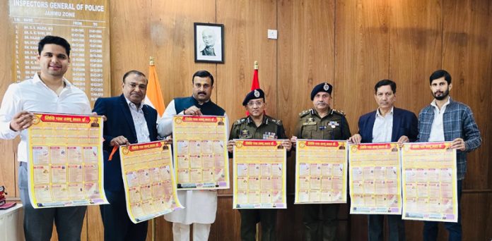 ADGP Jammu Anand Jain and DIG JSK Range Shiv Kumar Sharma releasing Tithi Patra Panchang in Jammu on Saturday.