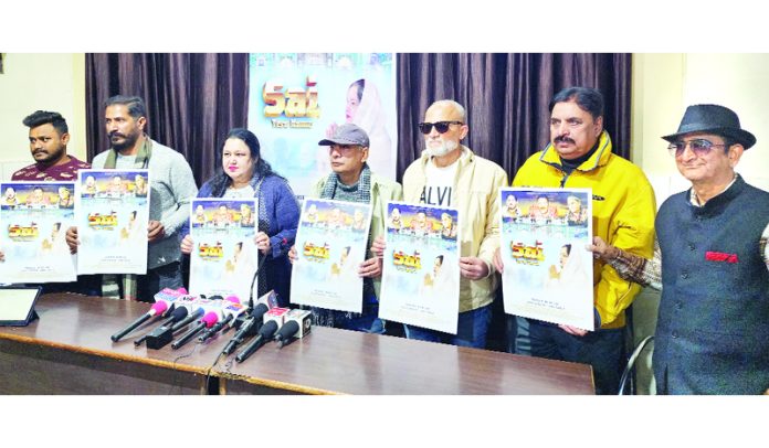 Dignitaries release poster of a Qawali in Jammu on Thursday. -Excelsior/Rakesh