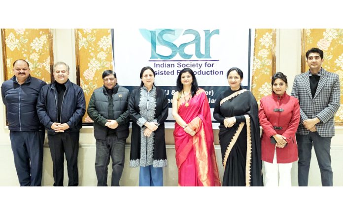 New team members of ISAR J&K chapter posing together for group photograph.