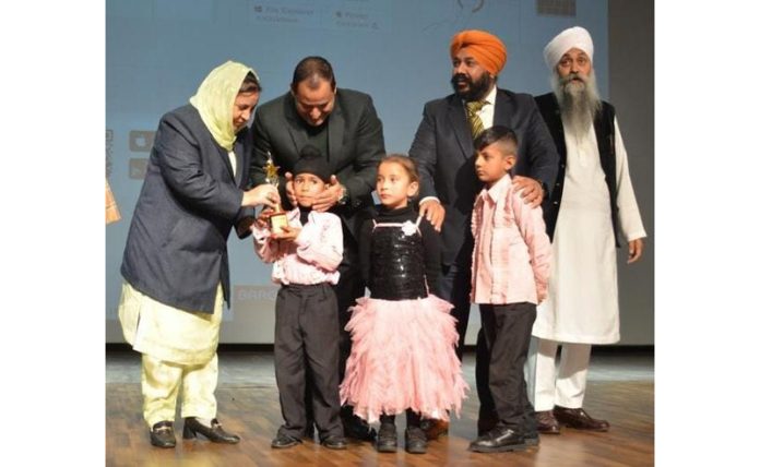 Minister Sakeena Itoo awarding students during the annual function of SGSD Int. School on Friday.