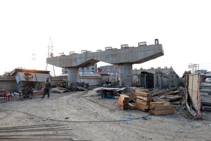 A view of the under-construction flyover at Sanat Nagar along NH44 in Srinagar on Wednesday. -Excelsior/Shakeel