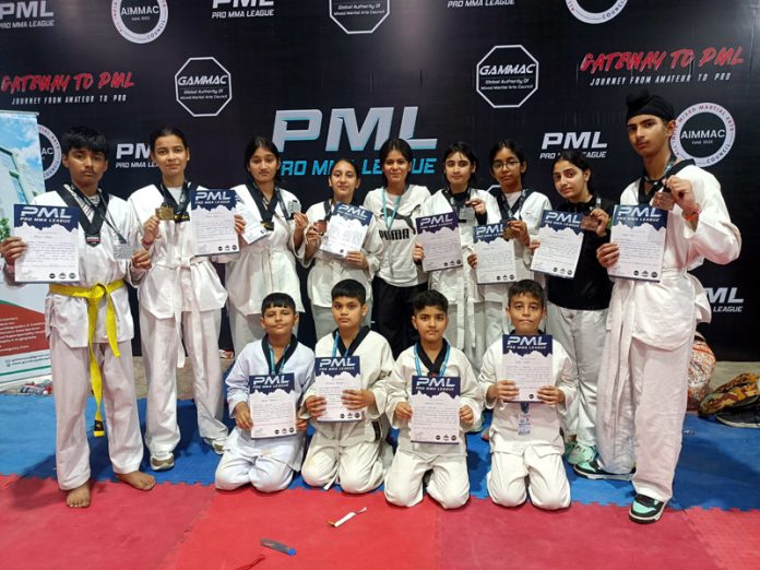 Students of Jammu Sanskriti School Jammu posing during National MMA (Mixed Martial Arts) Championships at Maharashtra. Students of Jammu Sanskriti School Jammu posing during National MMA (Mixed Martial Arts) Championships at Maharashtra.