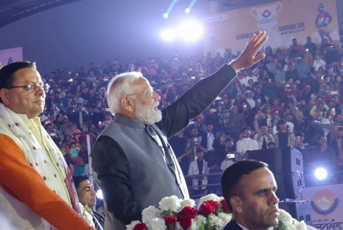 PM Narendra Modi attends the opening ceremony of 38th National Games at Dehradun on Tuesday. (UNI)