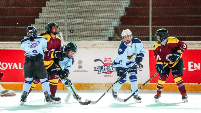 Ice hockey players in action during an exciting match at Leh on Tuesday during Royal Enfield Ice Hockey League Season 2. Ice hockey players in action during an exciting match at Leh on Tuesday during Royal Enfield Ice Hockey League Season 2.