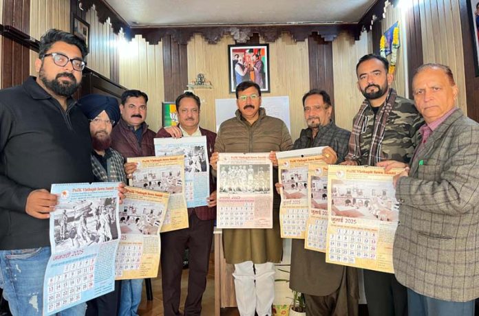 MLA Arvind Gupta along with others releasing PoJK 2025 Calendar in Jammu on Tuesday. MLA Arvind Gupta along with others releasing PoJK 2025 Calendar in Jammu on Tuesday.