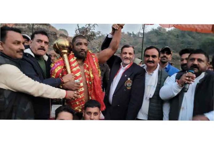 Dignitaries posing along with winning wrestler at Reasi on Friday. Dignitaries posing along with winning wrestler at Reasi on Friday.