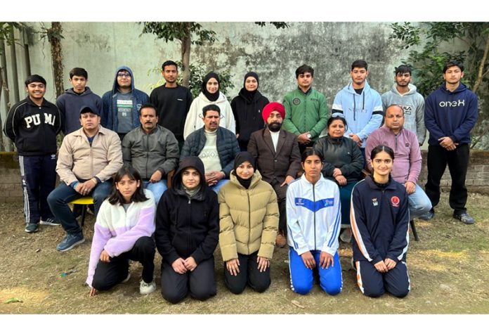 Judo team posing along with dignitaries before leaving for national Championship.