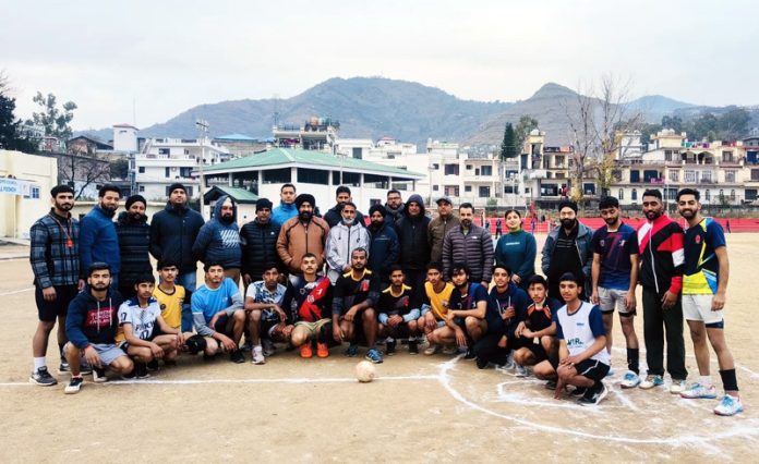 Handball players posing along with dignitaries during inauguration of championship at Poonch.