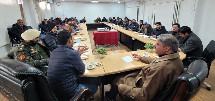 MLA Banihal Sajjad Shaheen chairing a meeting of officers of various departments.
