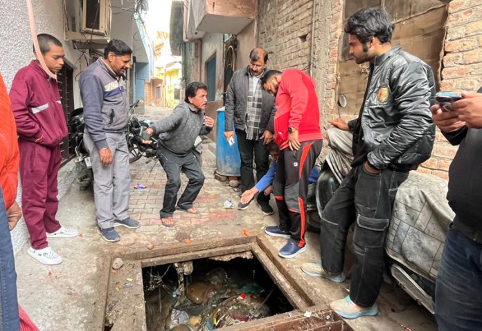 MLA Jammu West Arvind Gupta inspecting a deteriorating nallah in Mazdoor Basti, Resham Ghar, Jammu. MLA Jammu West Arvind Gupta inspecting a deteriorating nallah in Mazdoor Basti, Resham Ghar, Jammu.