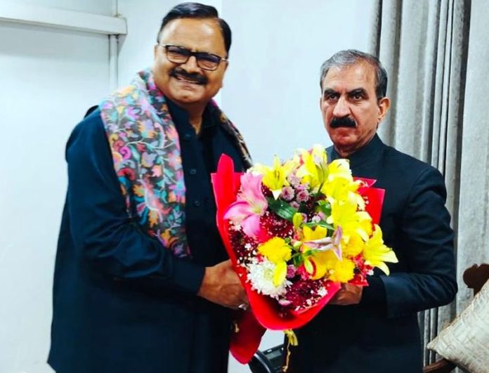 Minister Javed Rana presenting a bouquet to CM of Himachal Pradesh on Wednesday. Minister Javed Rana presenting a bouquet to CM of Himachal Pradesh on Wednesday.