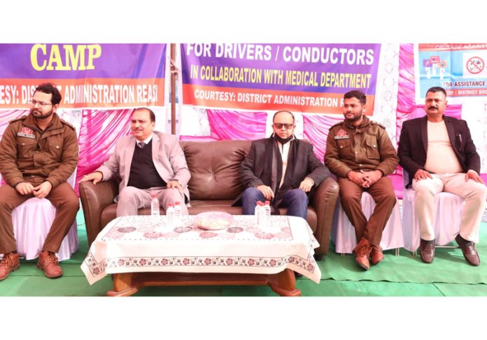 Guests during a health checkup camp organized at Bus Stand, Reasi.