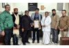 State Yoga Commissioner, Dr Shreyansh Kumar Jain along with his team honouring Dr Deepak Kumar (Deputy Superintendent, SCI Jammu).