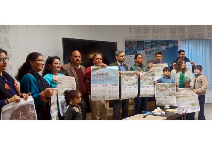 Chief Wildlife Warden Sarvesh Rai and others releasing the calendar. Chief Wildlife Warden Sarvesh Rai and others releasing the calendar.