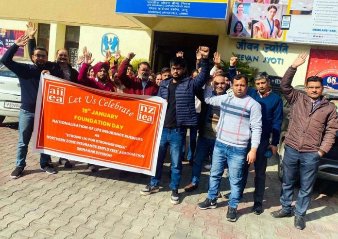 LIC employees raise slogans during launch of campaign 'Strong LIC for Stronger India'.