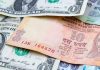 Rupee falls 25 paise to settle at 85.44 against US dollar