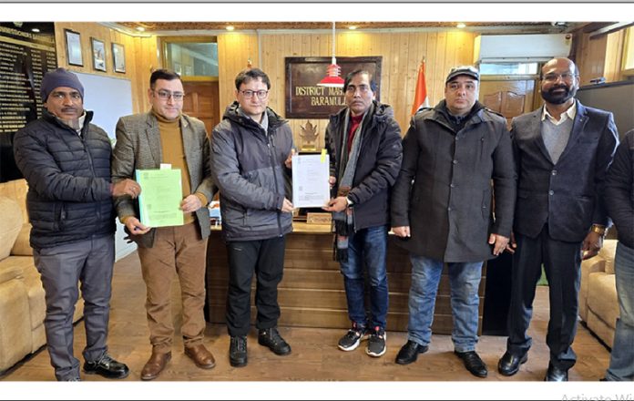 DDC Baramulla and Officials of NHPC after signing MoU. DDC Baramulla and Officials of NHPC after signing MoU.