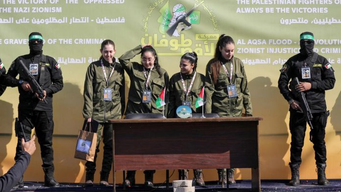 Four female Israeli soldiers, who had been held in Gaza since the deadly October 7, 2023 attack, are released by Hamas militants as part of a ceasefire and a hostages-prisoners swap deal between Hamas and Israel, in Gaza City.