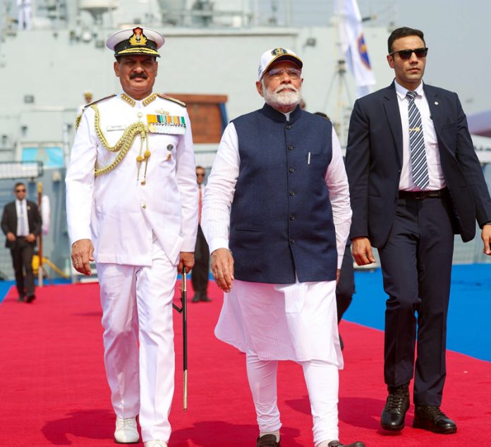 Prime Minister Narendra Modi at the commissioning of Indian Naval Ships Surat, Nilgiri and Vaghsheer in Mumbai on Wednesday. (UNI)
