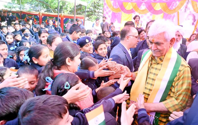 LG Manoj Sinha interacting with children during a function in Jammu on Thursday.