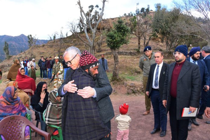 Chief Minister Omar Abdullah embracing Mohd Aslam, who lost his six children at Badhaal village in Rajouri on Tuesday.
