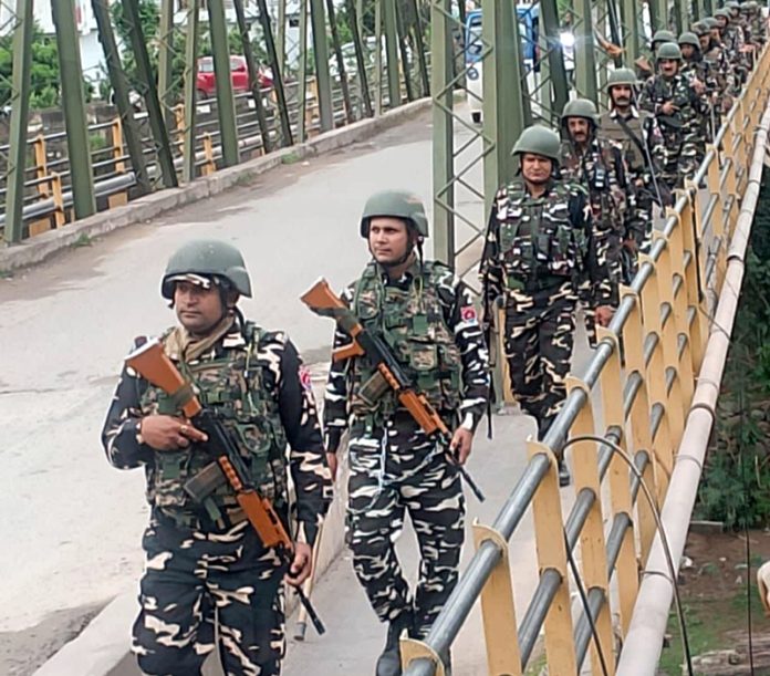 Security forces during a search operation in Rajouri on Wednesday. -Excelsior/Imran