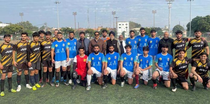 Players posing for group photograph during Christmas Gold Cup Football Tournament at Mini Stadium Parade Ground, Jammu on Saturday. Players posing for group photograph during Christmas Gold Cup Football Tournament at Mini Stadium Parade Ground, Jammu on Saturday.