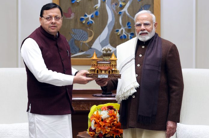 Uttarakhand Chief Minister Pushkar Singh Dhami presents replica of Narayan Ashram to Prime Minister Narendra Modi on Monday. Uttarakhand Chief Minister Pushkar Singh Dhami presents replica of Narayan Ashram to Prime Minister Narendra Modi on Monday.