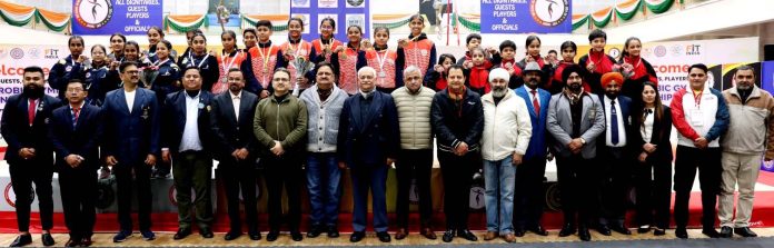 Dignitaries pose with gymnasts during prize distribution ceremony of National Aerobic Gymnastics Championship at M A Stadium.