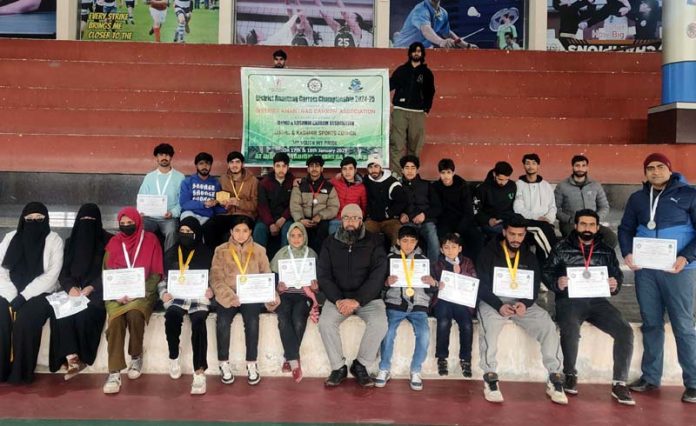 Dignitary posing along with Carrom players at Bijbehara.