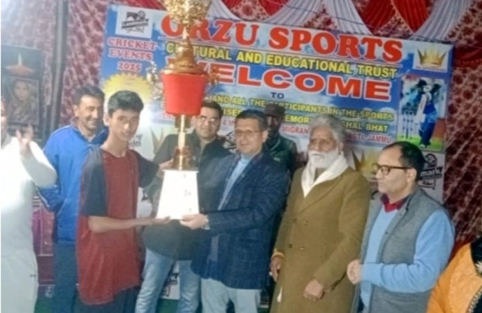 Winning team poses with dignitaries during closing ceremony of 19th KPL Cricket Tournament at Jagti Township, Jammu.