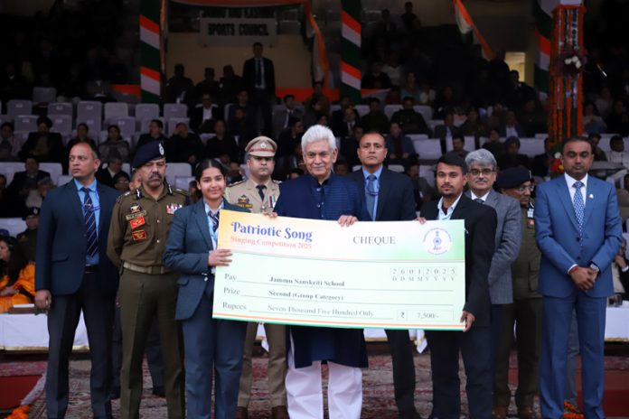 LG Manoj Sinha presenting cheque to Jammu Sanskriti School student at Republic Day function.