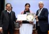 Manshika Rajput receiving award from dignitaries at New Delhi.