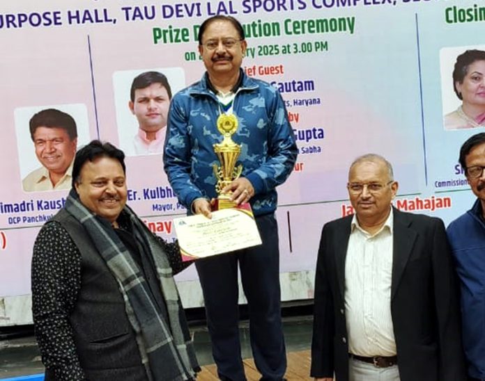Balbir Singh Jamwal receiving his trophy and certificate from a dignitary during All India Masters National Ranking Badminton Tournament at Panchkula. Balbir Singh Jamwal receiving his trophy and certificate from a dignitary during All India Masters National Ranking Badminton Tournament at Panchkula.