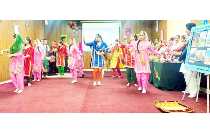 Students performing during a programme at APS Damana.