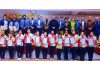 Dignitaries posing with gymnasts during opening ceremony of the National Aerobic Gymnastics Championship at MA Stadium, Jammu.