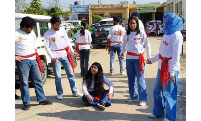 Artists from Information Department presenting a Nukkad Natak at Arnia in Bishnah.