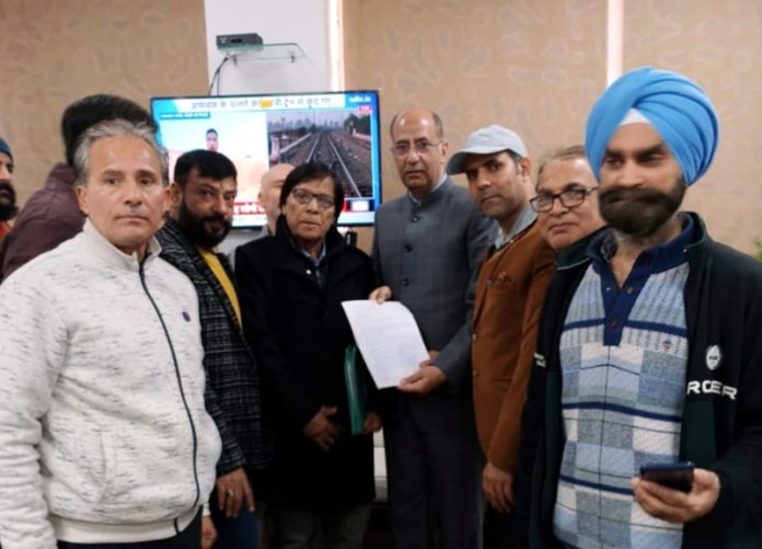 A delegation of NC Minority Cell handing over memorandum of demands to CM's Advisor. A delegation of NC Minority Cell handing over memorandum of demands to CM's Advisor.