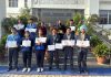 Students of Jammu Sanskriti School, Jammu posing along with certificates and medals.