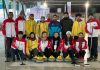 Ladakh’s Curling teams posing for group photograph.