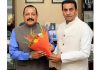 MLA Jasrota, Rajiv Jasrotia presenting a flower bouquet to Dr Jitendra Singh at New Delhi on Wednesday.