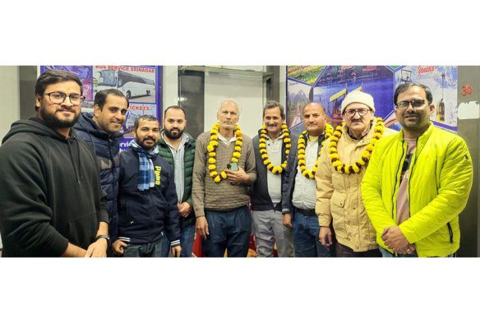 Members of the new team of Gen Bus Stand Shopkeepers' Association posing for a group photograph.