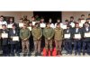Hariom Khare, Commandant 100 Battalion CRPF posing with the students during a function organised in Jammu on Thursday.
